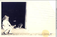 Vidie Burden with Sloppy, the cat at the Barn