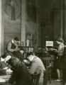 Students perusing books in the New Book Shelf area, 1944