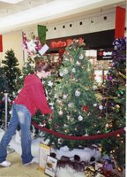 2002  Volunteers Rachel and Maureen Fosdick decorate Christmas tree