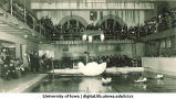 Performance by women swimmers at the Dolphin Show, the University of Iowa, 1920s