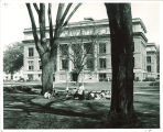 Class meets on lawn on north side of Macbride Hall, the University of Iowa, 1950s?