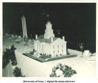 Old Capitol table centerpiece next to candelabra at Centennial Dinner, Iowa Memorial Union, University of Iowa, February 25, 1947