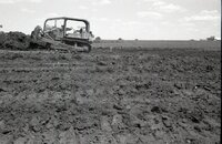 1970s Earthmoving machinery in field