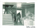 Men moving items into Main Library, the University of Iowa, 1951