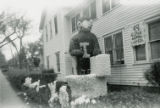 Alpha Kappa Lambda Homecoming lawn display, ""Plunging to Victory,"" 1962