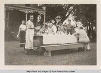 People at a picnic bench