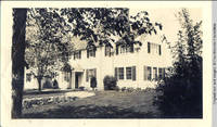 White house front after addition in the spring