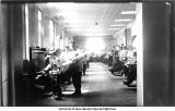 Students in the Dental Clinic, south row, Old Dental Building, The University of Iowa, March 26, 1910