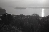 Barges being towed on river
