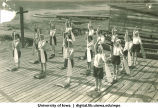 Land drill demonstrating diagonal draw and reach, The University of Iowa, 1930s