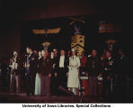 Honorary Cadet Colonel Majorie Campbell on stage at military ball, The University of Iowa, 1950