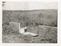 1963 Concrete water drainage culvert in field