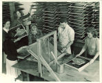 Art students printing second World War posters, The University of Iowa, 1943
