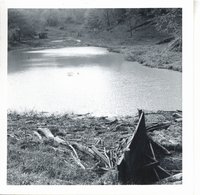 Debris at inlet after flooding on Dr. Irwin flood control dam, 1968