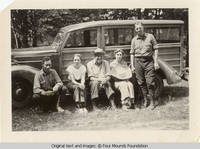 Bill and Elizabeth by a van