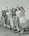 Homecoming Queen candidates, waving from the railroad tracks, Homecoming, 1950