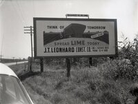 J.T. Leonard Construction Sign on Billboard by the side of the road