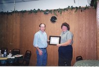 2001  Melissa Tucker Accepts landlord/tenant award from Commissioner Chairman Todd Heckenberg
