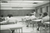 Standing individual lectures to seated students, 1978