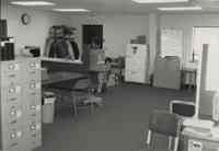 Office Photo with Refrigerator, Chairs and Table