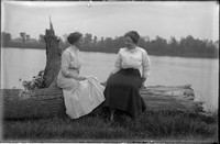 UP610 Ellen Hanson and woman on log by river
