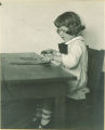Girl playing with wood blocks, The University of Iowa, ca. 1920