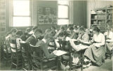 Students writing in classroom, The University of Iowa high school, 1919