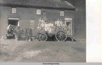 Flour mill workers on wagon, Amana, Iowa, 1900s