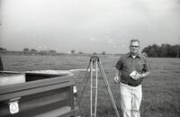 Oren Champ and survey equipment