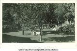 Women in Greek costume dancing on the Pentacrest lawn, The University of Iowa, 1920