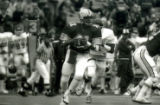 ISU quarterback ready to pass during the Homecoming Game, 1985