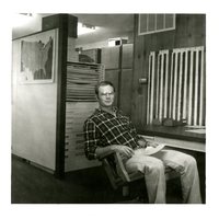 Man Leaning Back in Office Chair