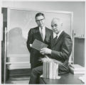 Leo V. Mayer standing by Earl O. Heady, 1966