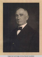 John V. Rider in a suit