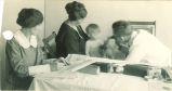Physical examination of an infant, The University of Iowa, 1920s