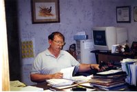 Gentleman at Desk Working 