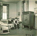 Children listening to a large wooden radio, The University of Iowa, January 12, 1938