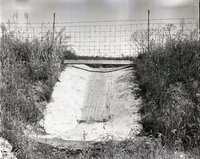 Cement water runoff structure in field