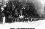 Marching band on Clinton Street, The University of Iowa, 1914