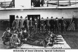 Cadets in rifle class in gymnasium, The University of Iowa, 1919