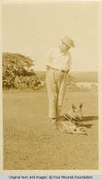 Bill Burden standing with Tar