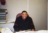2001  NRCS (Natural Resources Conservation Service) District Conservationist Terrance Rudolph sits in his  office