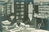 College of Pharmacy Dean Wilbur J. Teeters and secretary in his office, The University of Iowa, 1910s