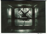 Engineering students looking into wind tunnel, The University of Iowa, August 1940