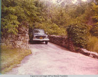 Truck parked at front entrance of Four Mounds