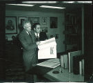 Library Director Ralph Ellsworth, left, and librarian Clyde Walton in Special Collections Dept., The University of Iowa, 1951