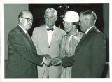 Iowa State Board of Regents president Harry Hagemann with outgoing members Roy Stevens, Mrs. Morris Berkness and Clifford Strawman, June 19, 1959