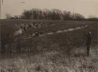 Earth fill dam washed out.