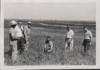Inspecting the Foss Sarchett's farm for the Register and Tribune Contest.