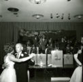 Couples dancing to Les Elgart and his band at the Homecoming Dance, 1965